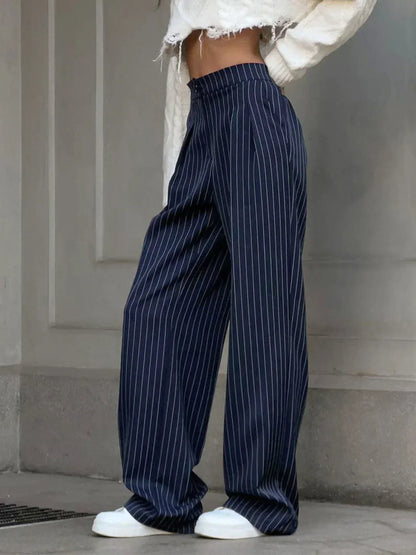 Rodica - Pantaloni de birou cu pliuri și picior larg cu dungi